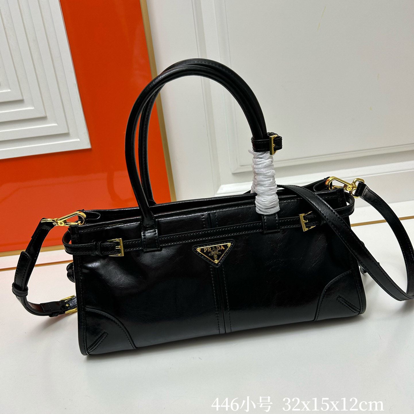 Pra*a top handle bags
